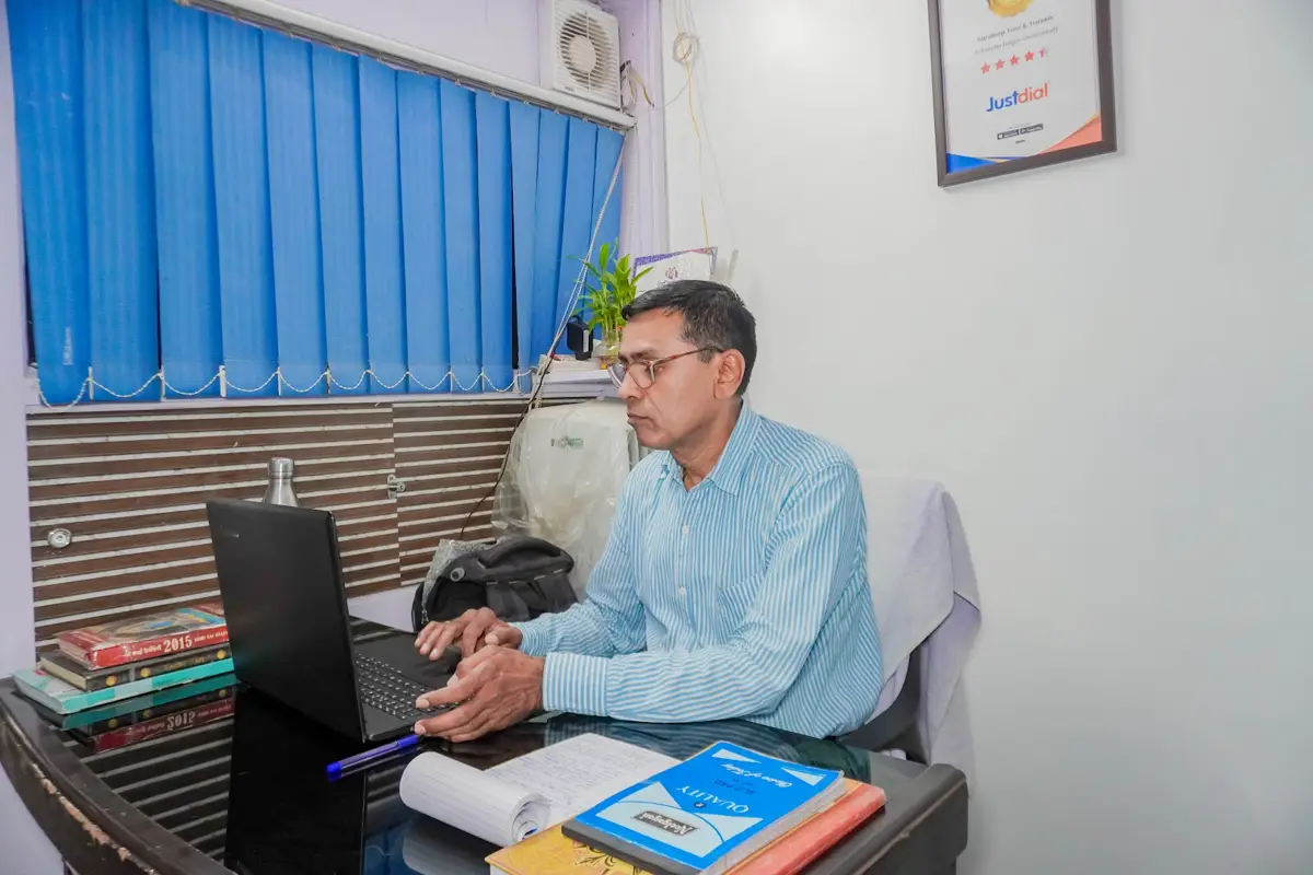 Prem Chand at the booking desk