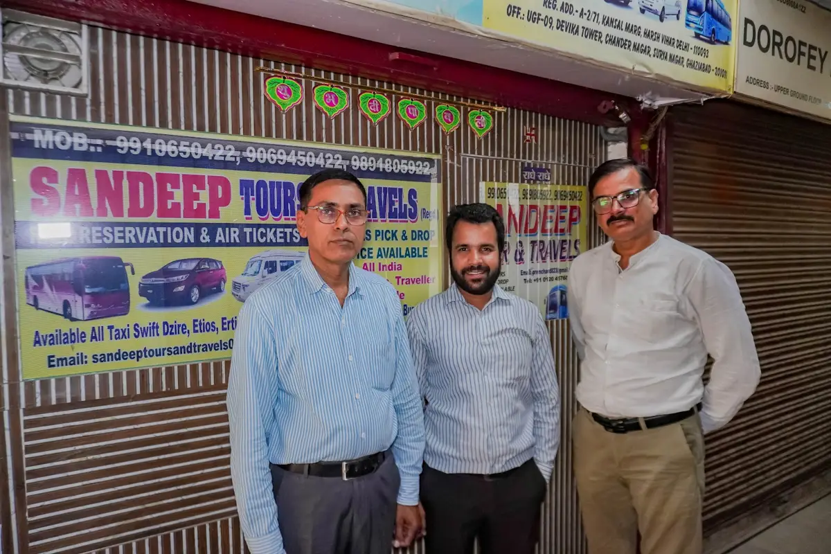 The Sandeep Tour & Travels team outside the office